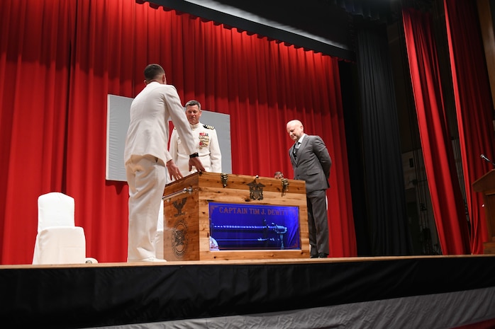 Capt. Tim DeWitt, Naval Facilities Engineering Systems Command Fast East, is relieved by Capt. Lance Flood during a change of command and retirement ceremony for DeWitt on board Fleet Activities Yokosuka, Japan, Oct. 28.