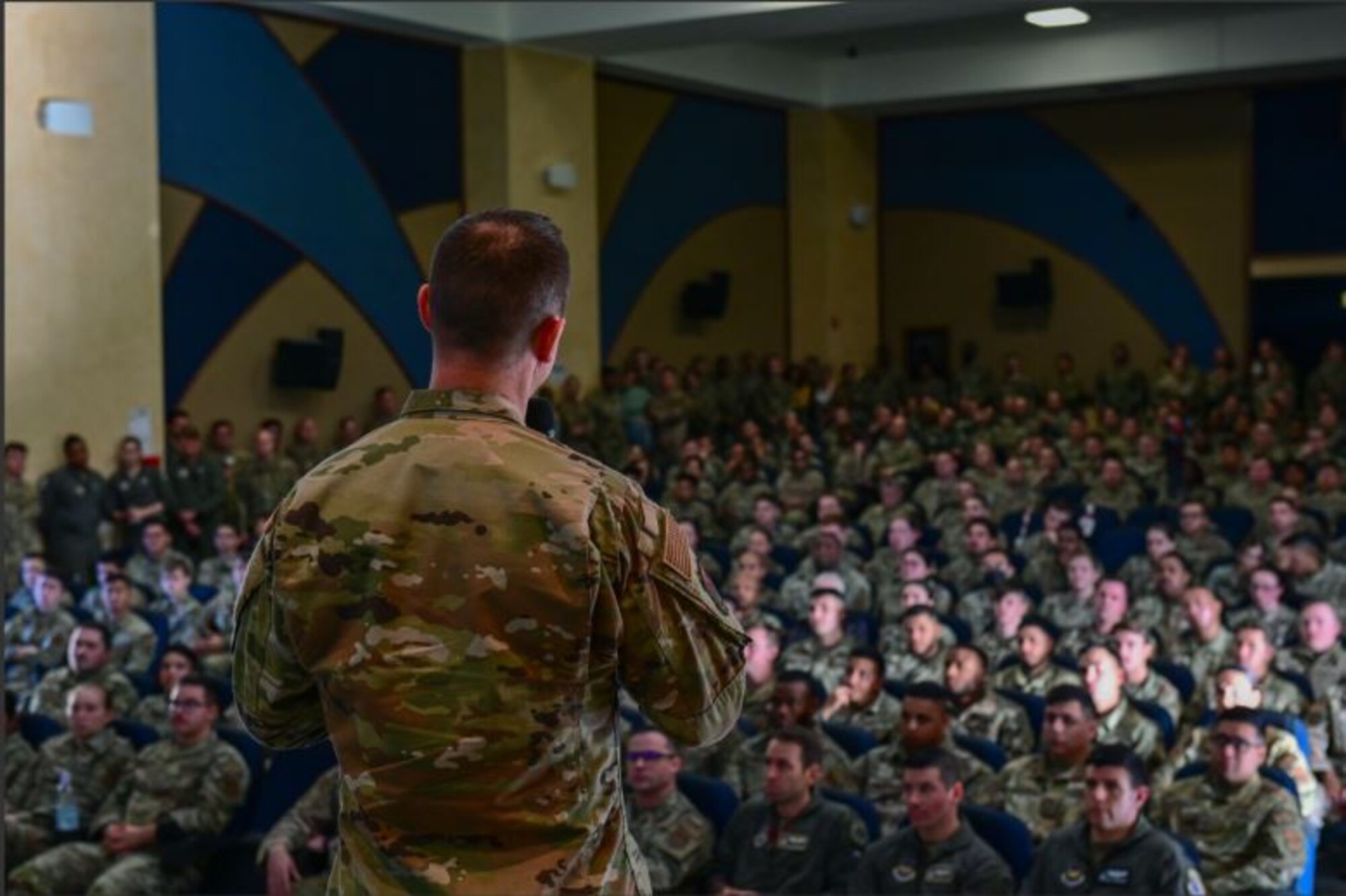U.S. Air Force Brig. Gen. Tad Clark, 31st Fighter Wing commander, briefs during an all-call at Aviano Air Base, Italy