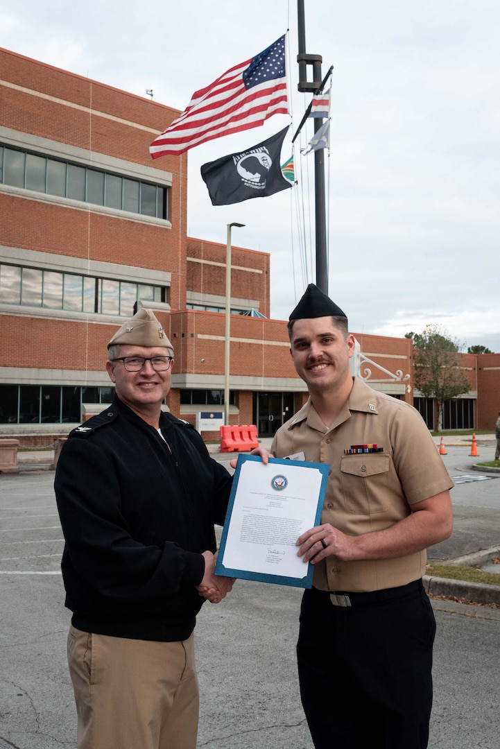 Hospitalman Noah Yost receives a Letter of Commendation for his service in the clinic’s Patient Centered Medical Home Department.