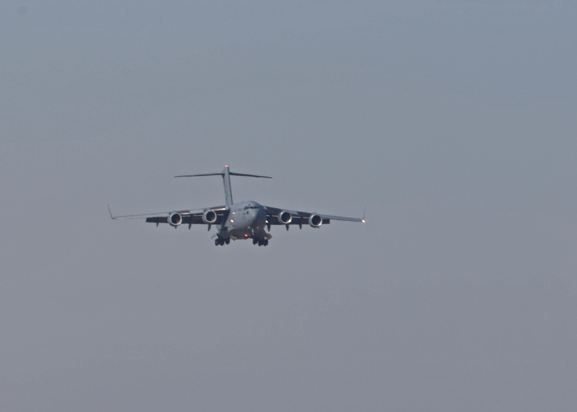 A C-17 Globemaster III aircraft from the 62d Airlift Wing, Joint Base Lewis-McChord, Washington, prepares to land at Gowen Field, Boise, Idaho, Oct. 20, 2022. The 62d AW held its semi-annual readiness exercise, Exercise Rainier War 22B from Oct. 6-22. (U.S. Air Force photo by Staff Sgt. Zoe Thacker)