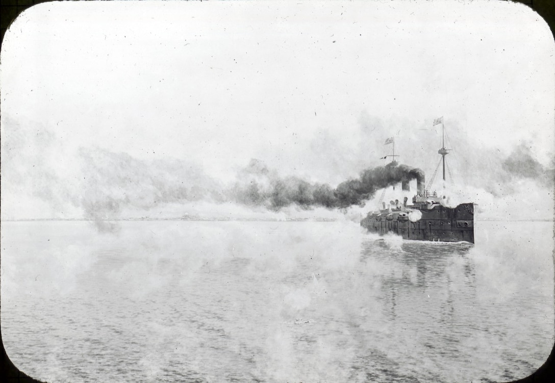 USS Baltimore in action in black and white