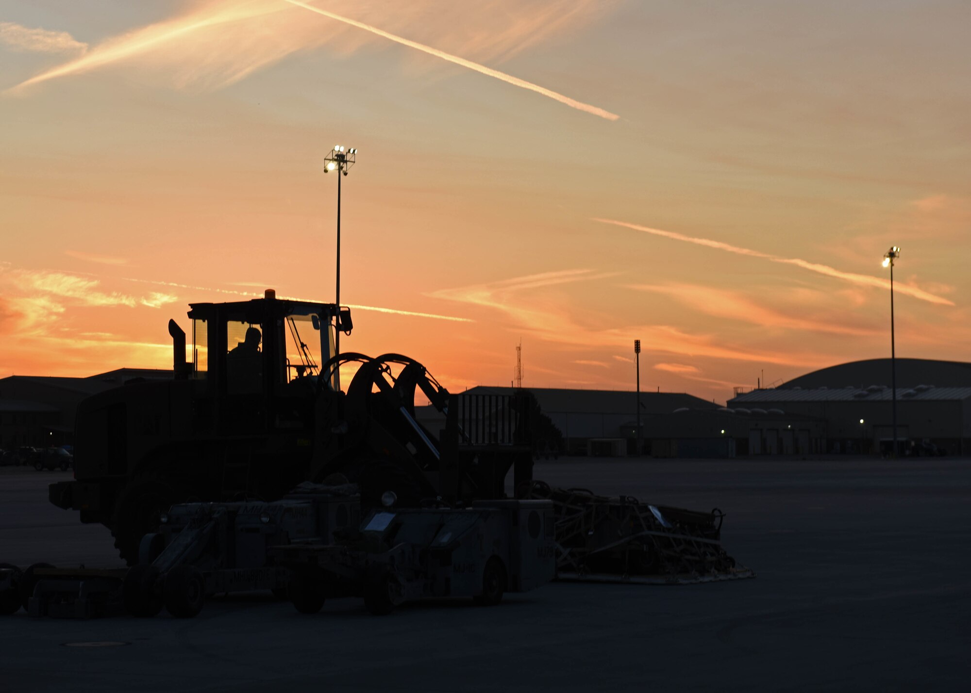 U.S. Air Force Tech. Sgt. Daniel Lackey, aerial porter with the 62d Aerial Port Squadron, prepares to transport cargo onto a C-17 Globemaster III aircraft with a forklift during Exercise Rainier War 22B at Mountain Home Air Force Base, Idaho, Oct. 19, 2022. Rainier War is a semi-annual exercise designed to demonstrate the 62d Airlift Wing, 627th Air Base Group and 446th Airlift Wing’s ability to generate, employ and sustain operations. (U.S. Air Force photo by Staff Sgt. Zoe Thacker)