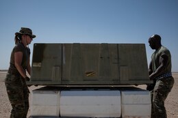 Airmen offload munitions