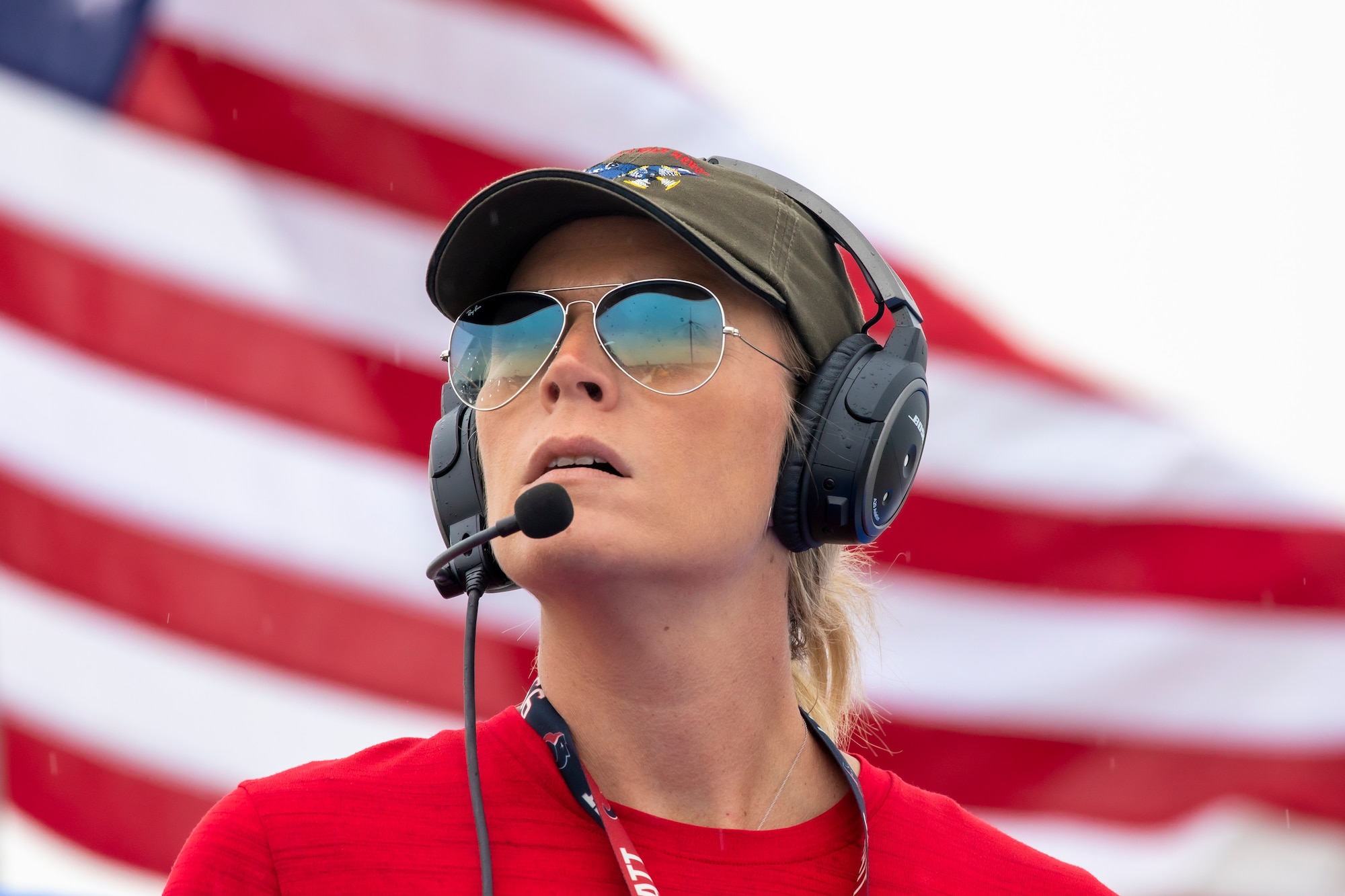 Woman in front of US Flag