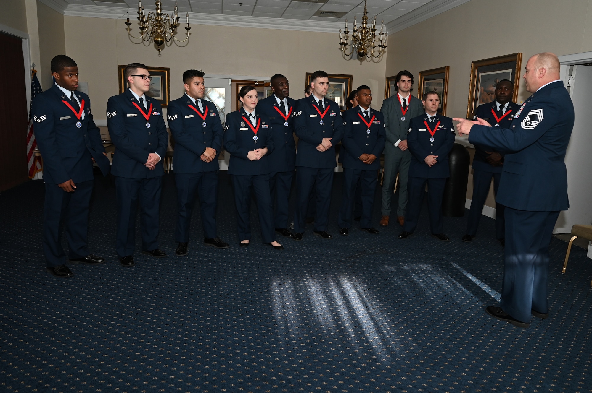 Image of Airman speaking to class graduates