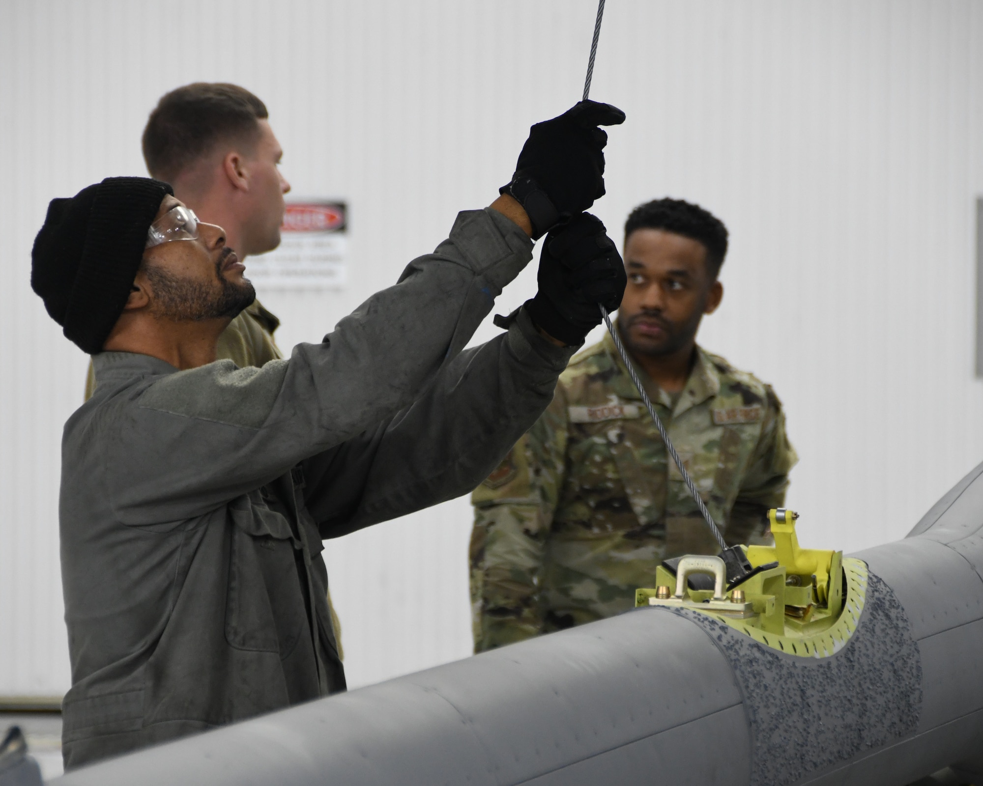 Maintainers with the 459th Maintenance Squadron install a new boom in one of its KC-135 Stratotanker aircraft. The members of the squadron continuously maintain, update and upgrade the aircraft and its features to ensure this weapons system is always ready to answer the Nation's call.