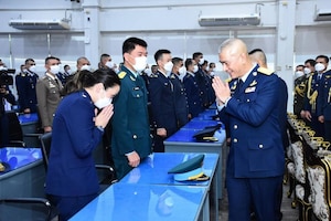 U.S. Air Force Maj. Jessica Padoemthontaweekij meets Royal Thai Air Force Commander Air Chief Marshal Alongkorn Wannarot during the opening ceremony for Class 67 of the Air Force Chiefs of Staff Course, RTAF Air Command and Staff College, Bangkok, Thailand, Oct. 19, 2022.
