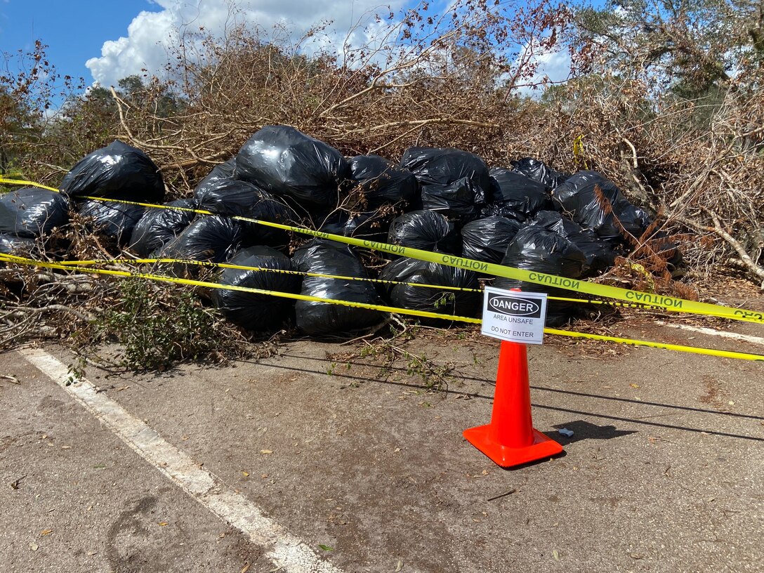 Debris pile at W.P. Franklin Lock and Dam South Day Use Area following Hurricane Ian