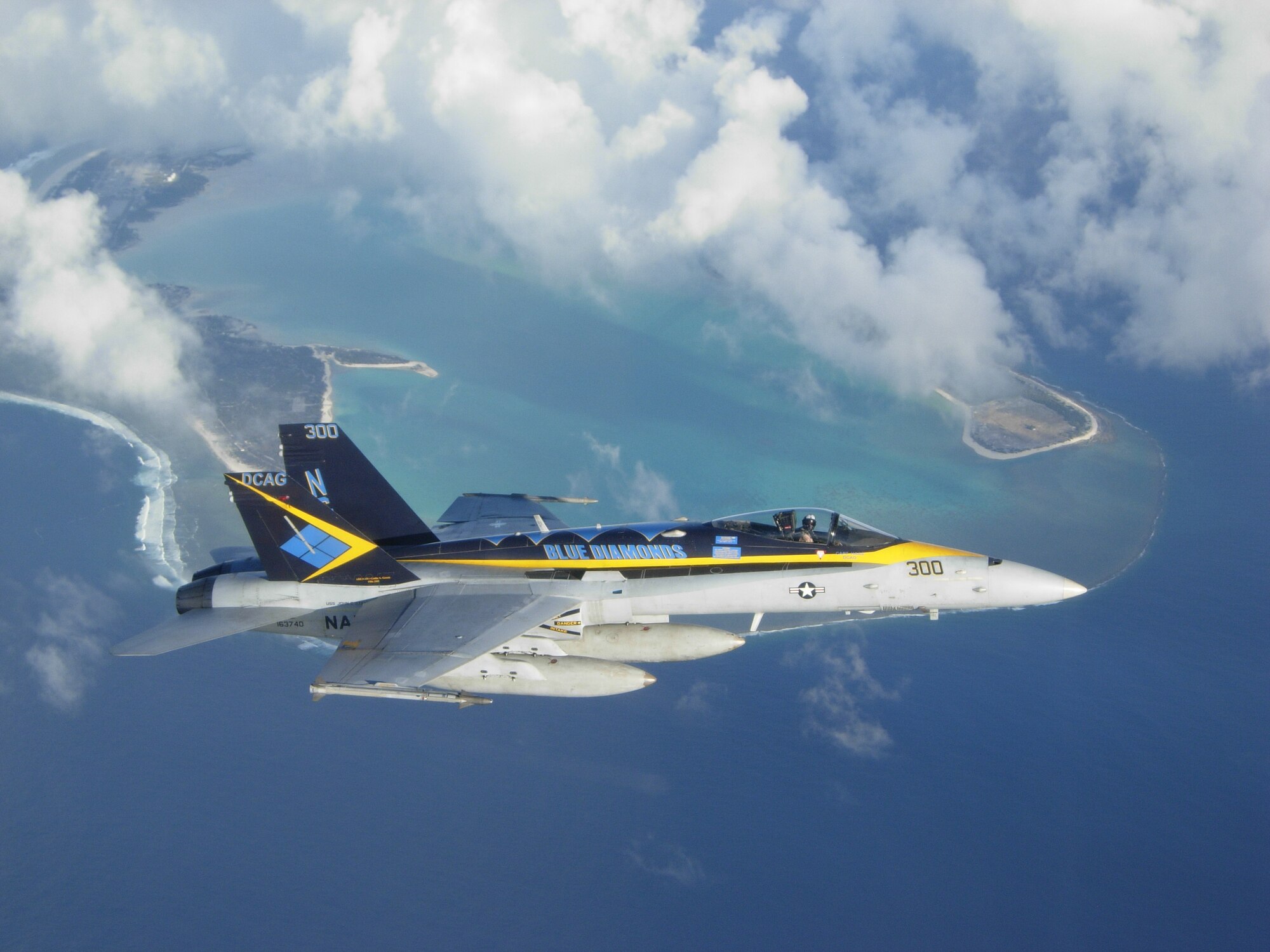 Jet flying over ocean
