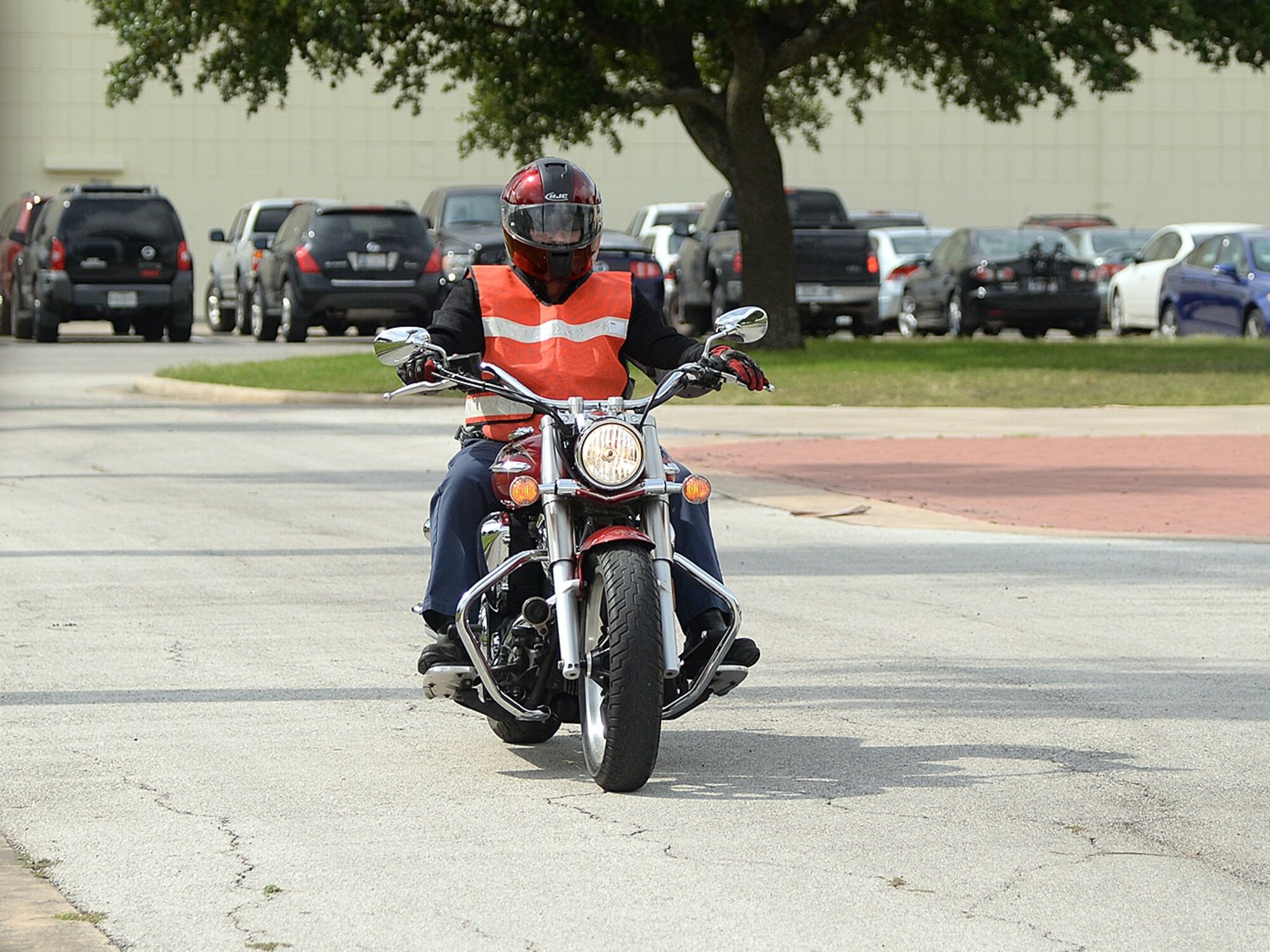 Dale Owens, 12th Flying Training Wing, rides off base on his motorcycle