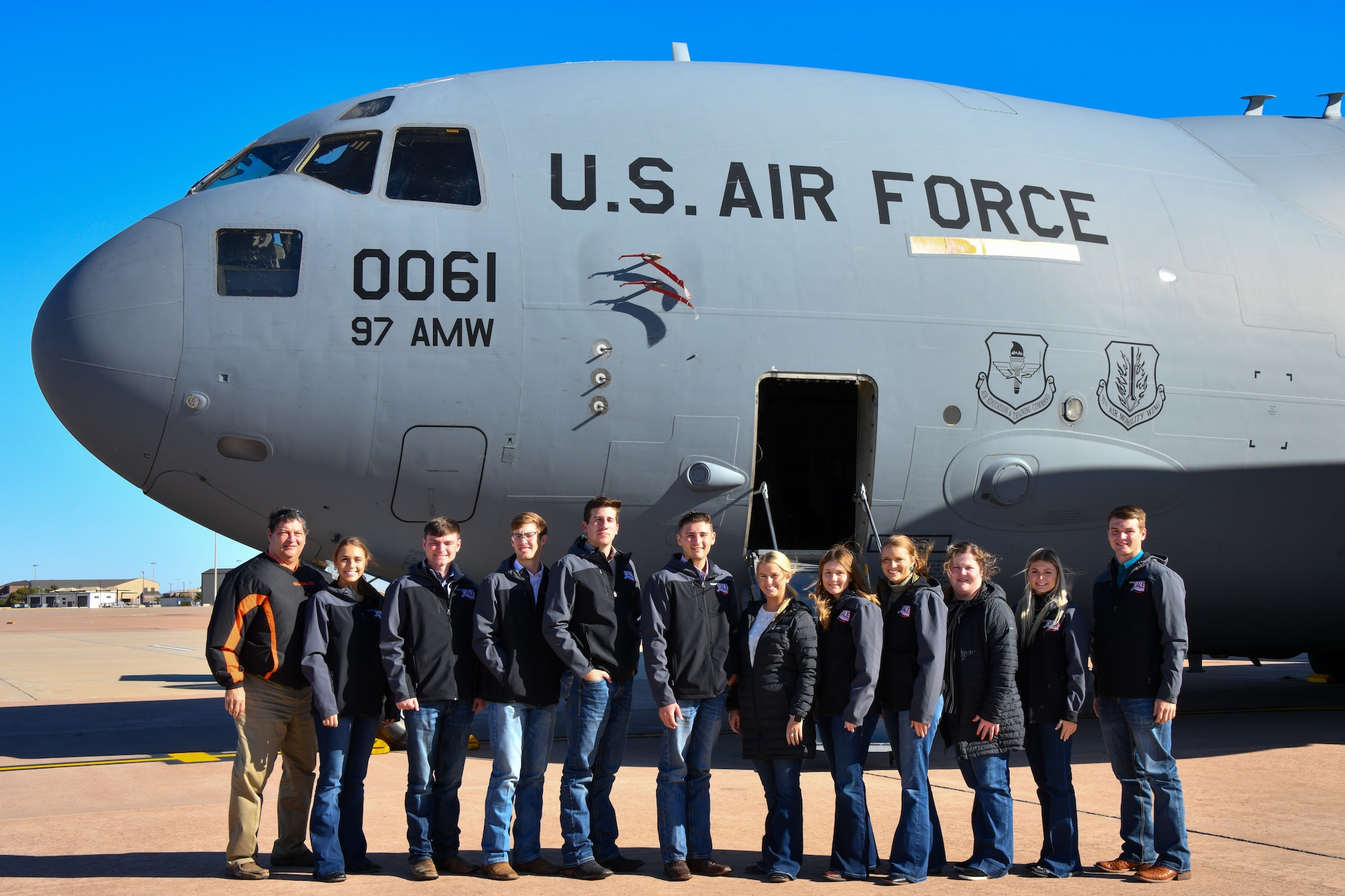 Students from Oklahoma State University’s Agricultural Leadership Experience pose for a photo in front of a C-17 Globemaster III at Altus Air Force Base (AAFB), Oklahoma, Oct. 25, 2022. For most of the students, the tour of AAFB was the first time they had ever been on an Air Force base. (U.S. Air Force photo by Airman 1st Class Kari Degraffenreed)