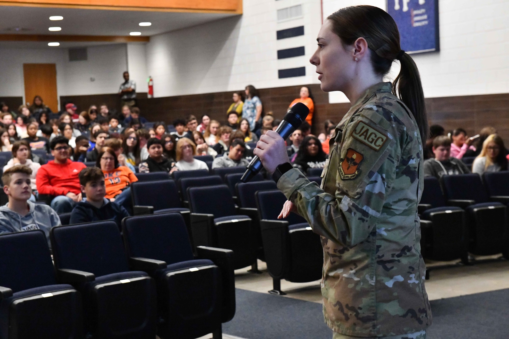 U.S. Air Force Airman 1st Class Delaney Maufroy, 97th Judge Advocate paralegal, speaks to students during a Red Ribbon Week presentation at Altus High School, Oklahoma, Oct. 26, 2022. Maufroy’s speech focused on the legal disciplines one must face after consuming, possessing or selling illegal substances. (U.S. Air Force photo by Airman 1st Class Miyah Gray)