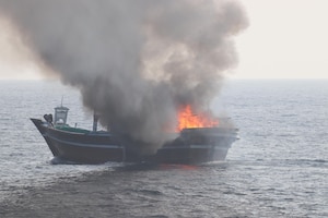 GULF OF OMAN (Oct. 29, 2022) A civilian fishing vessel burns in the Gulf of Oman, Oct. 29. The vessel, found to be smuggling illicit cargo, was set on fire by the fishing vessel’s crew as U.S. forces approached.