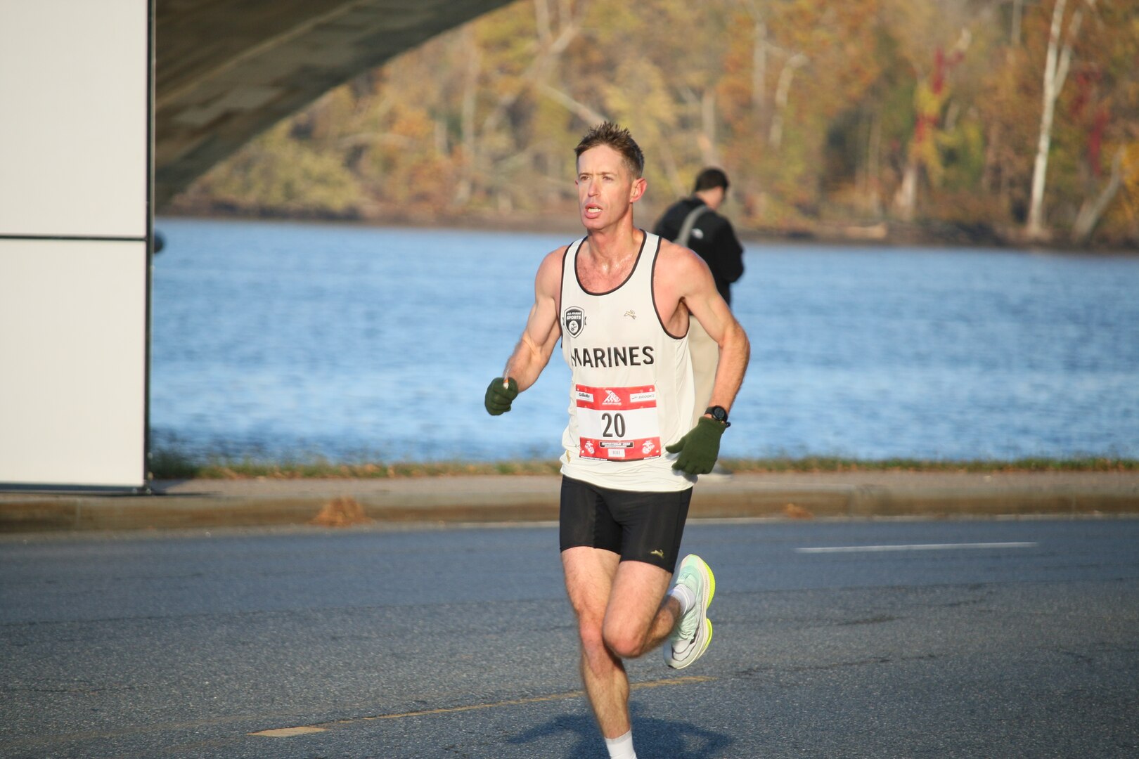 Marine Corps Capt Kyle King of Twentynine Palms, California jumps out in front of the competition to win the 47th Marine Corps Marathon as well as the Armed Forces Men's Gold.  The 2022 Armed Forces Marathon Championship held in conjunction with the 47th Marine Corps Marathon in Washington, D.C.  The Armed Forces Championship features teams from the Marine Corps, Navy (with Coast Guard runners), and Air Force.  Department of Defense Photo by Mr. Steven Dinote - Released.