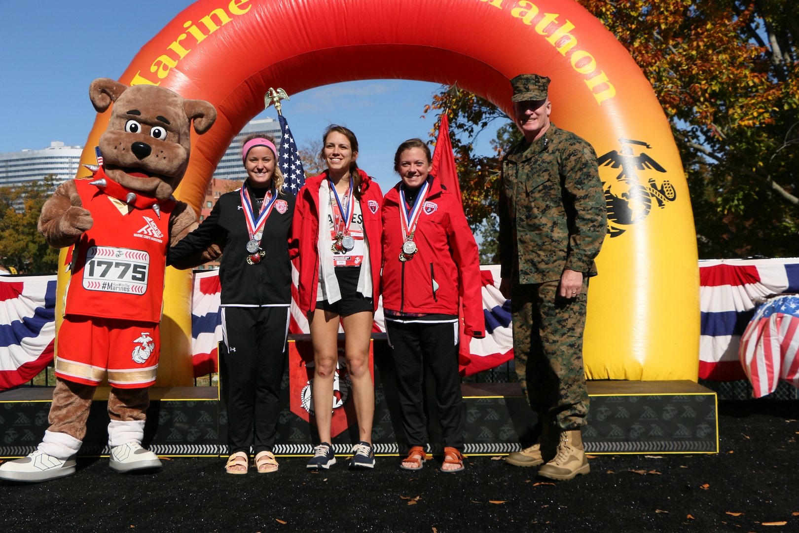 All-Marine Women's Marathon Team capture silver during the 2022 Armed Forces Marathon Championship held in conjunction with the 47th Marine Corps Marathon in Washington, D.C.  The Armed Forces Championship features teams from the Marine Corps, Navy (with Coast Guard runners), and Air Force.  Department of Defense Photo by Mr. Steven Dinote - Released.