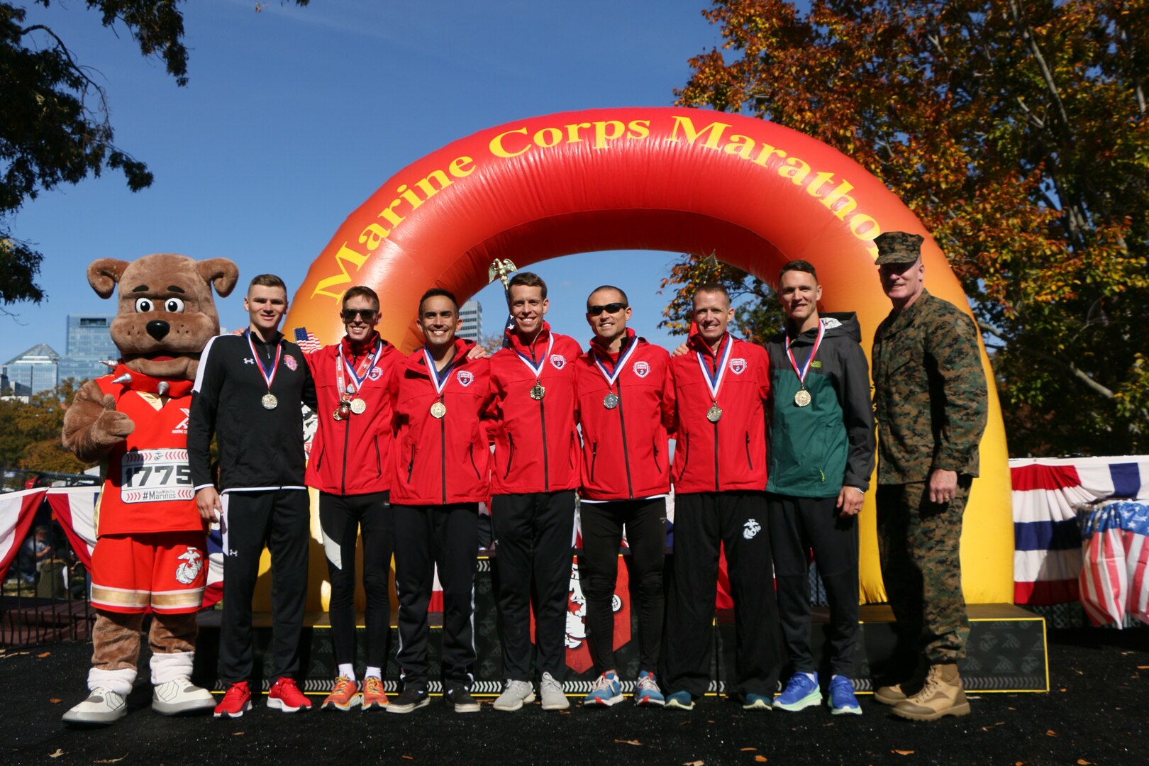 Marine Corps men capture their first Armed Forces gold during the 2022 Armed Forces Marathon Championship held in conjunction with the 47th Marine Corps Marathon in Washington, D.C.  The Armed Forces Championship features teams from the Marine Corps, Navy (with Coast Guard runners), and Air Force.  Department of Defense Photo by Mr. Steven Dinote - Released.
