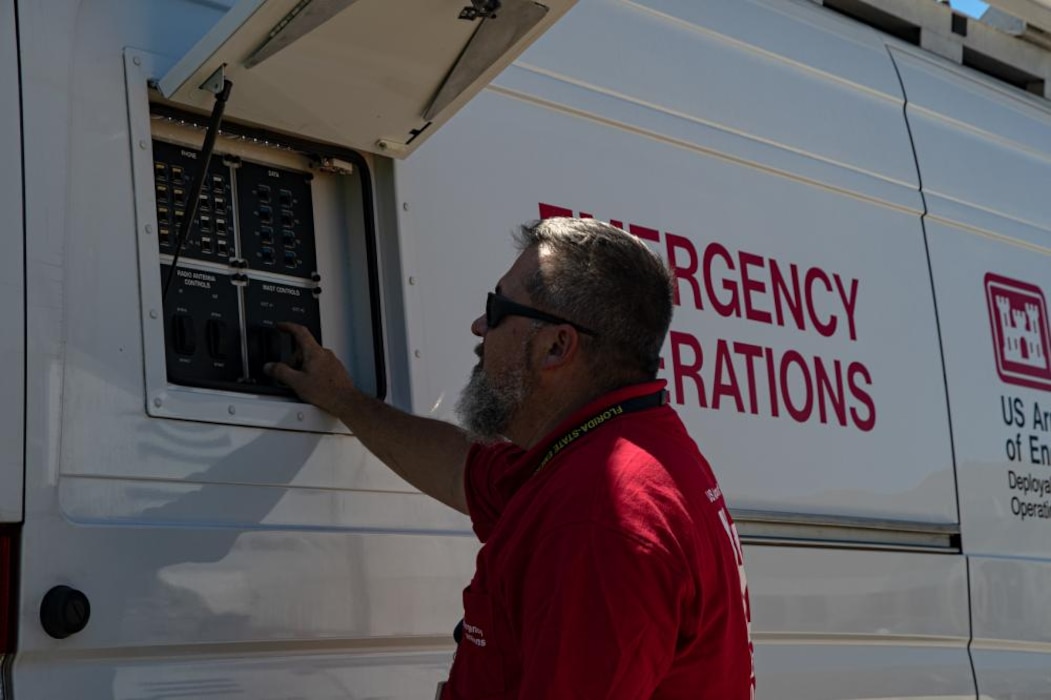 U.S.Army Corps of Corps Engineers, Jacksonville District, Deployable Tactical Operations System (DTOS), operator Ronald Zurfluh works on setting up the MCV2 outside of the Lee County Emergency Operations Center.
Every year, USACE, as part of the federal government’s unified national response to disasters and
emergencies, deploys hundreds of people to provide technical engineering expertise and to promote capacity development at home and abroad.