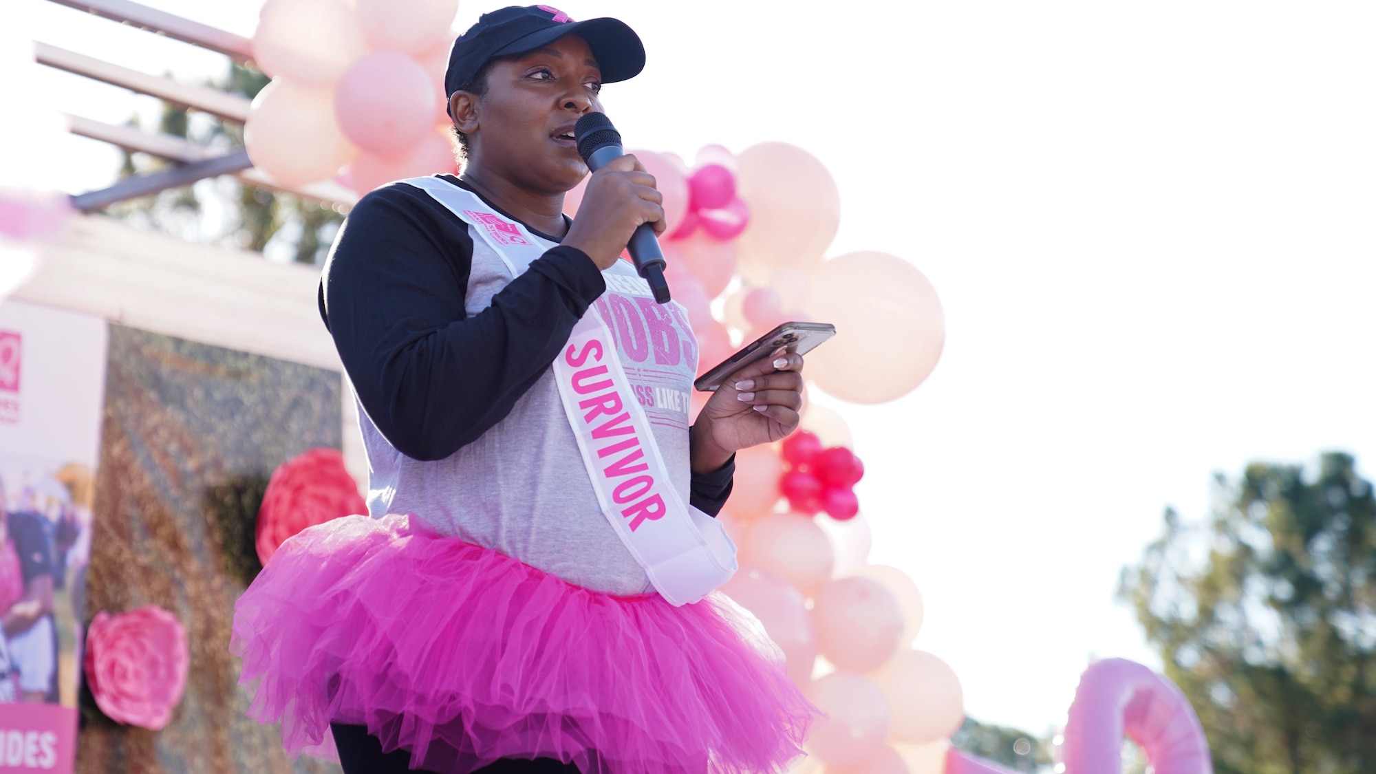 U.S. Air Force Tech. Sgt. LeVonya Davis, 81st Medical Support Squadron medical information systems section chief,  speaks to the a crowd at the Mississippi Gulf Coast Strides Against Breast Cancer 5K in held at the AJ Holloway Sports Complex in Biloxi, Mississippi, Oct. 15, 2022.