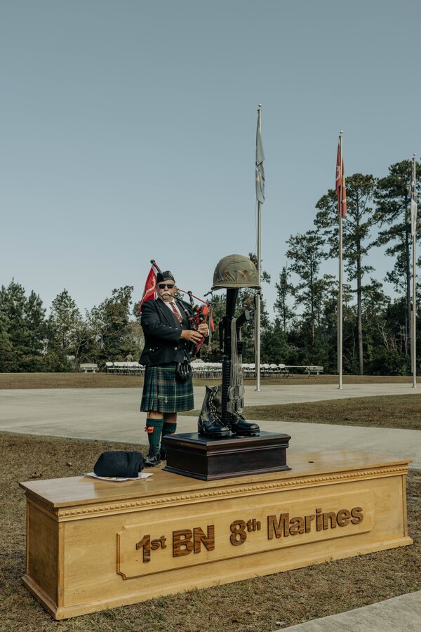 Michael Greenham, a retired Marine, plays the Marines Hymn on bagpipes during the opening ceremony of the 39th Beirut Memorial Run at the Beirut Memorial in Jacksonville, North Carolina, Oct. 21, 2022.