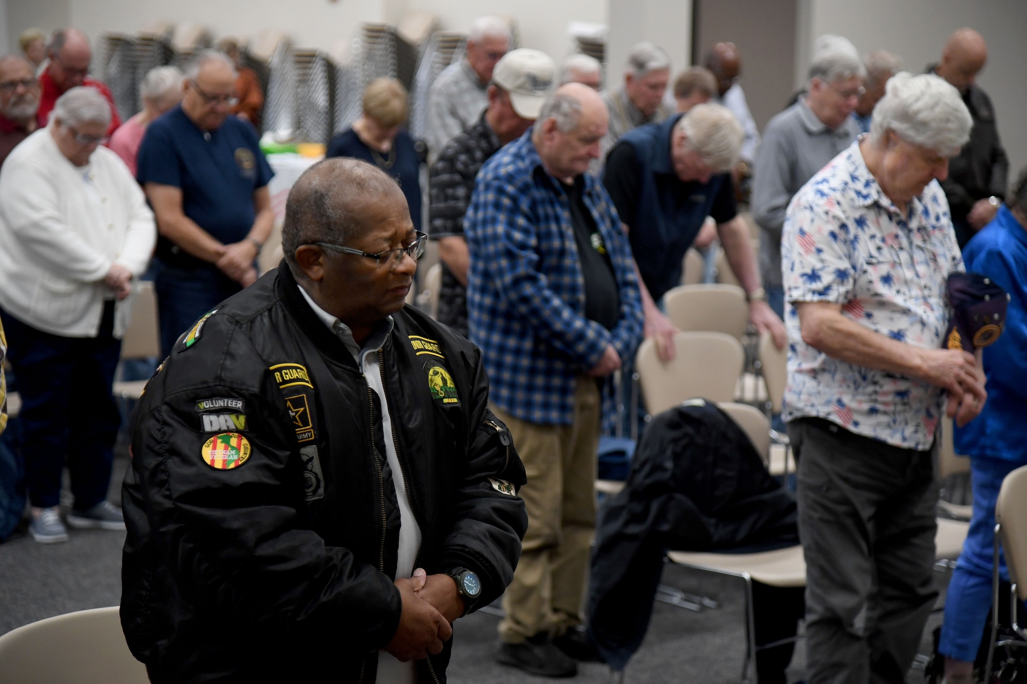 U.S. Air Force Retired Staff Sgt. Aaron Lewis and other retirees attend Retiree Appreciation Day inside the Roberts Consolidated Aircraft Maintenance Facility at Keesler Air Force Base, Mississippi, Oct. 28, 2022.