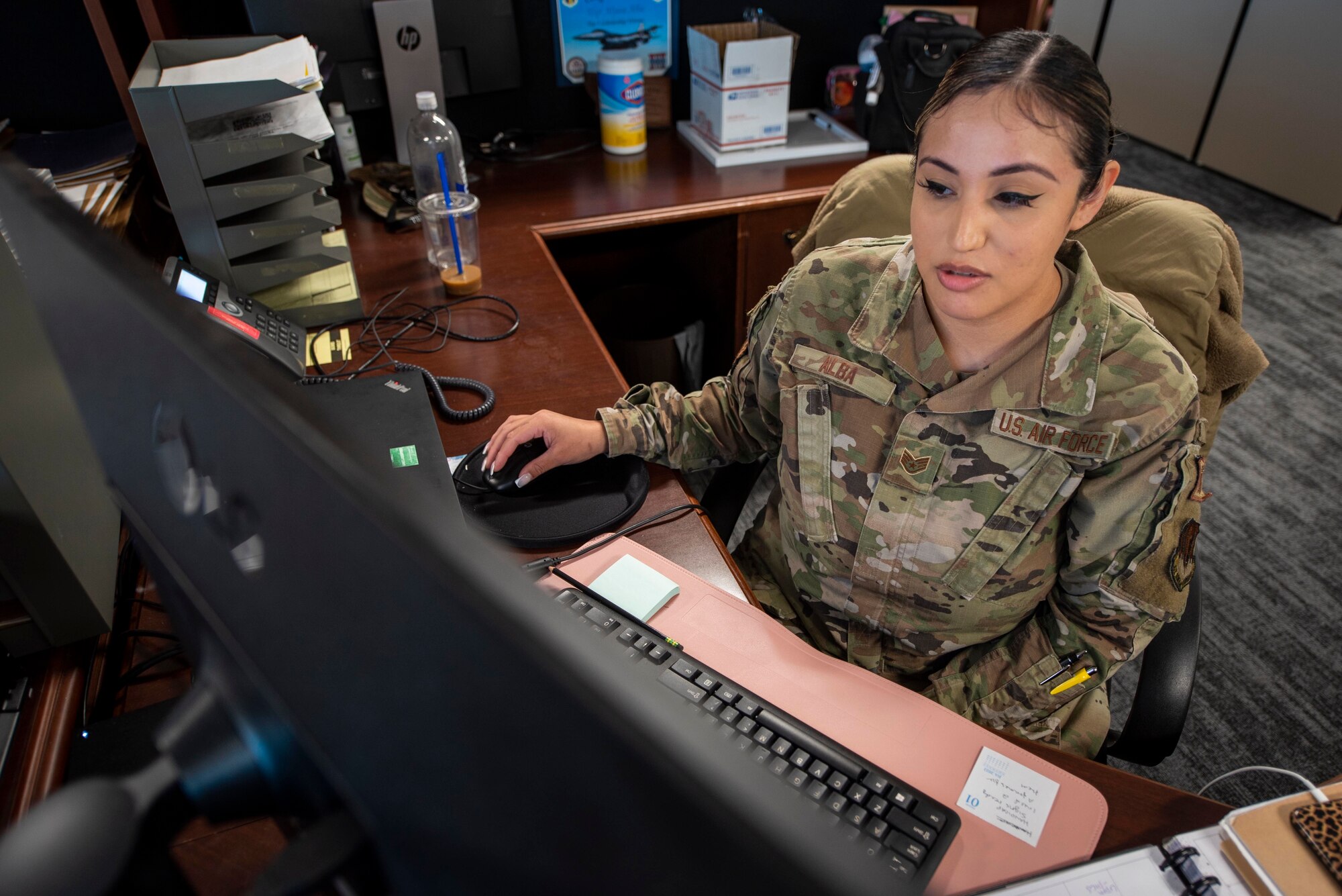 Airman works at computer