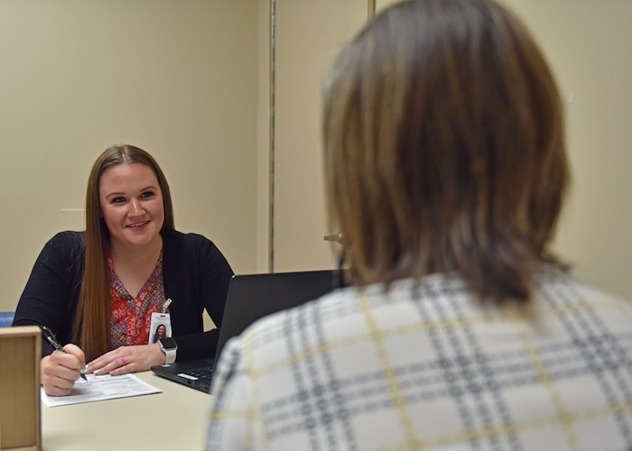 Christyn Mundy, social worker, practices performing a mental health evaluation, San Angelo, Texas, Oct. 27, 2022. Mundy wants Goodfellow service members to know about the plethora of mental health services available through avenues such as: Military OneSource, base mental health clinic, and military and family life counselors. (U.S. Air Force photo by Airman 1st Class Zachary Heimbuch)