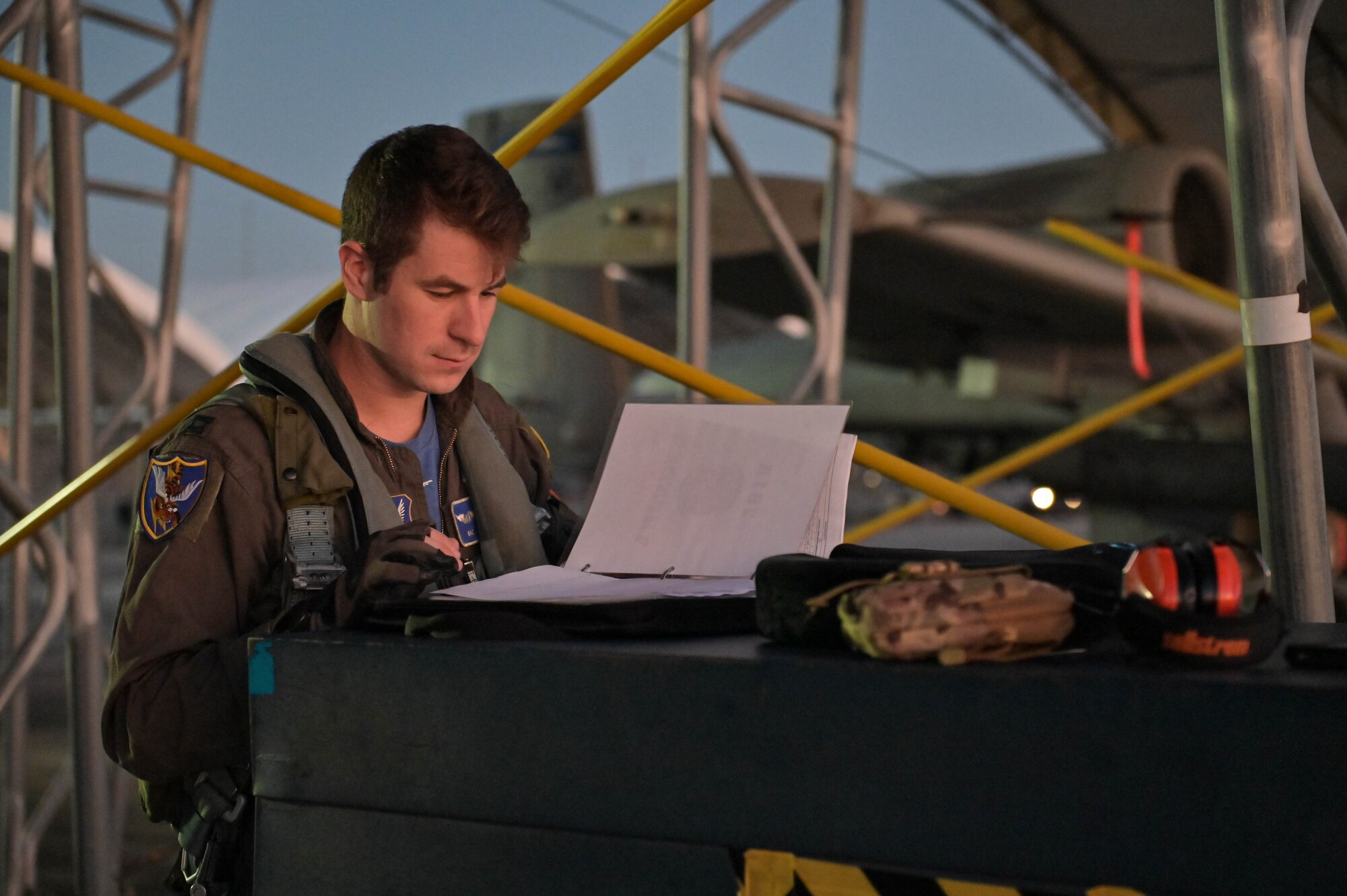 U.S. Air Force Capt. Matthew Dorsey, 74th Fighter Squadron A-10C Thunderbolt II pilot, reviews the aircraft status before his pre-flight inspection at Moody Air Force Base, Georgia, Oct. 16, 2022.The 23rd Wing deployed A-10C Thunderbolt II aircraft and support personnel to Andersen Air Force Base, Guam for a routine Dynamic Force Employment Operation. (U.S. Air Force photo by Senior Airman Rebeckah Medeiros)