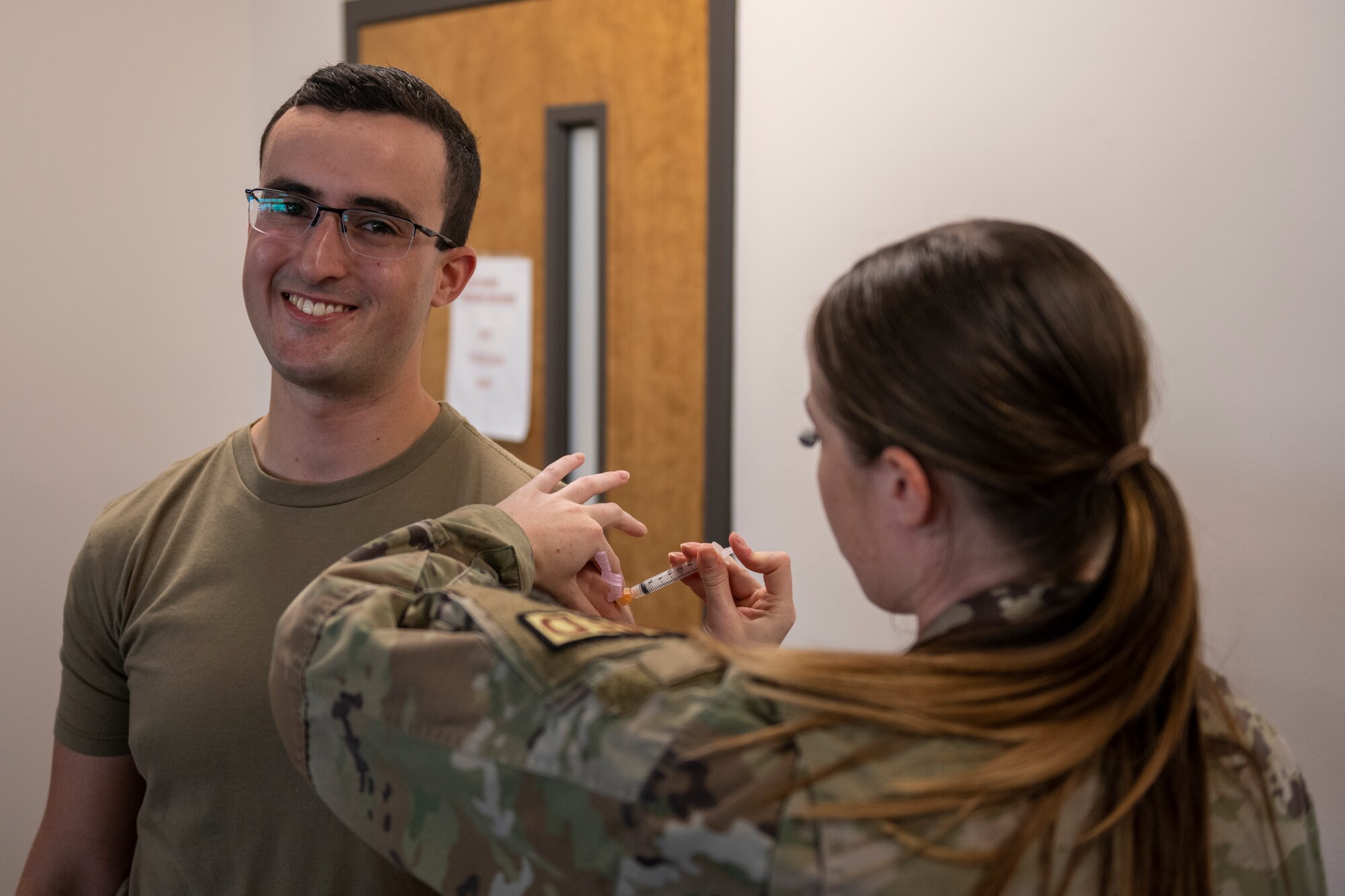 Airman receives a typhoid immunization