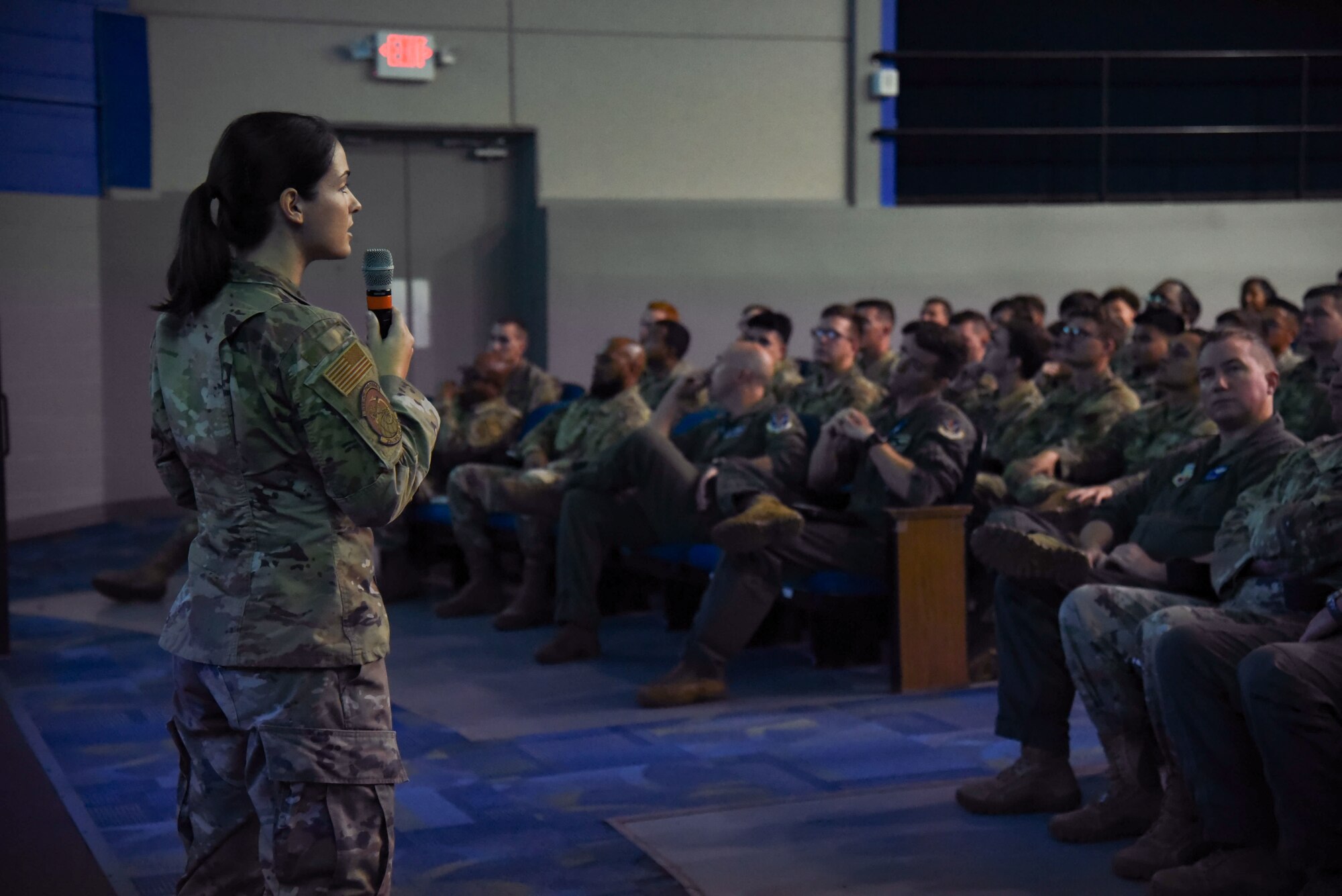 A photo of an Airman speaking.