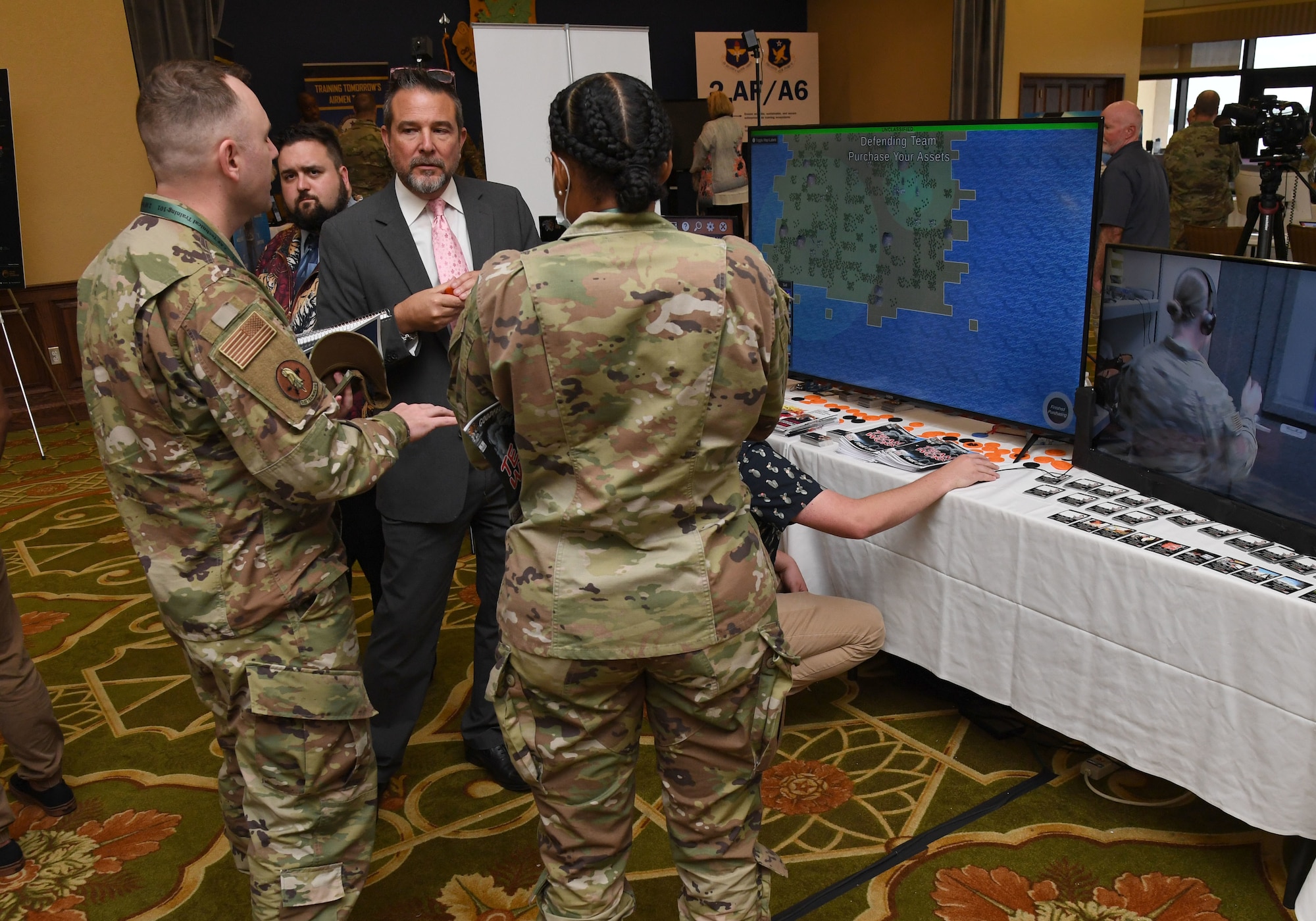 Members of Second Air Force attend the innovation expo during the Second Air Force Technical Training-101 Seminar inside the Bay Breeze Event Center at Keesler Air Force Base, Mississippi, Oct. 25, 2022.