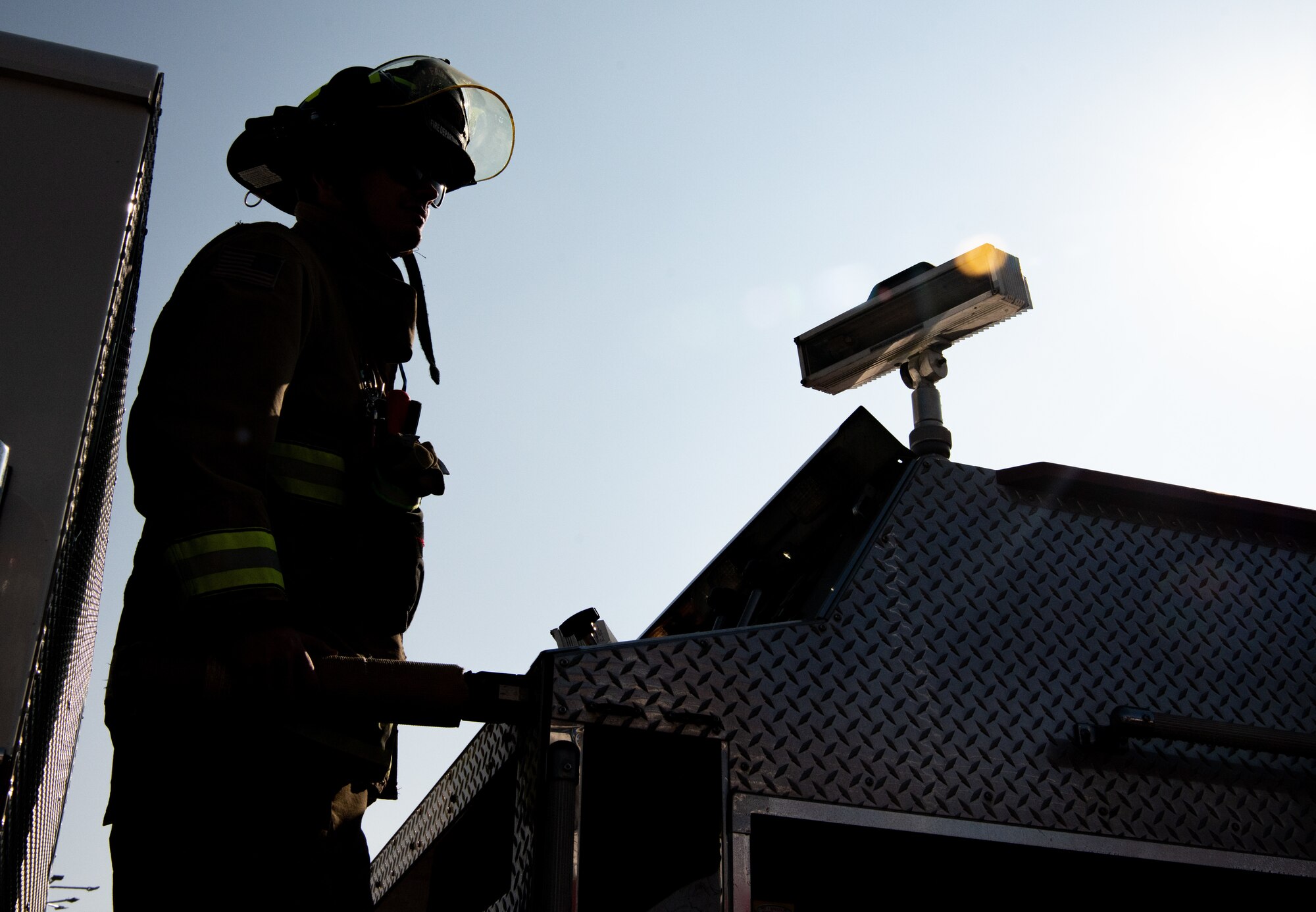 Staff Sgt. Logan Hunt, 8th Civil Engineer Squadron lead firefighter, operates water controls during a local firefighter training event at Wolmyung Stadium, Gunsan City, Republic of Korea, Oct. 28, 2022. The controls allow members to determine water pressure and navigating to different pumps. (U.S. Air Force photo by Staff Sgt. Sadie Colbert)