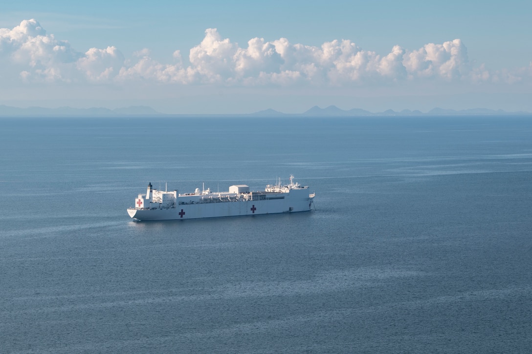 USNS Comfort (T-AH 20) is anchored off the coast of Puerto Barrios, Guatemala