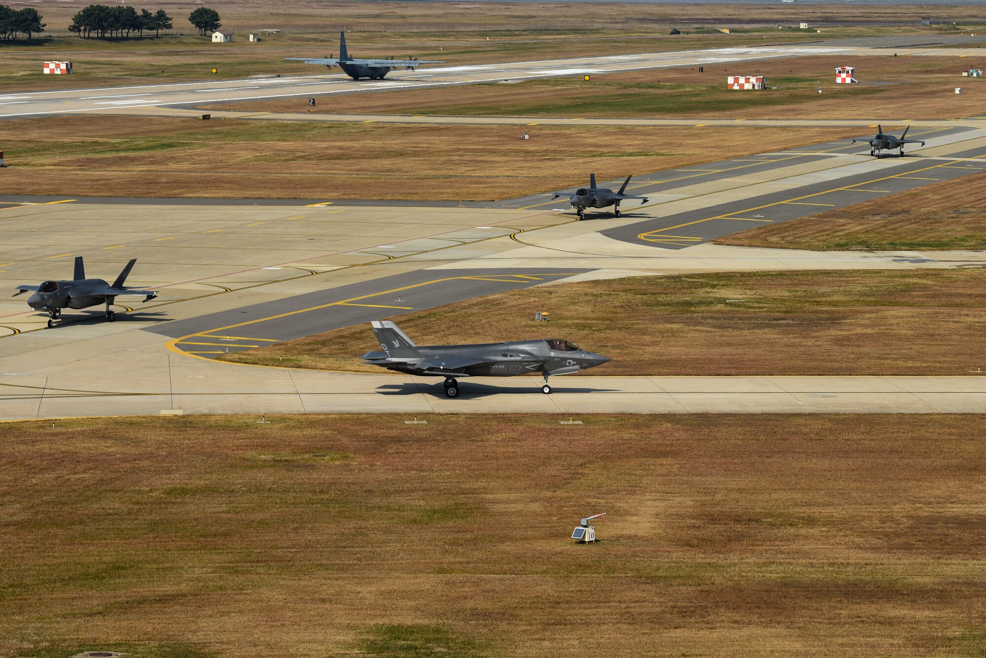 Four U.S. Marine Corps F-35B Lightning II aircraft with Marine Fighter Attack Squadron (VMFA) 242 taxi down the flightline at Kunsan Air Base, Republic of Korea, Oct. 31, 2022. The aircraft traveled to Kunsan as a part of the Pacific Air Forces command sponsored VIGILANT STORM 23 training event. VIGILANT STORM integrates U.S. and ROK forces to train on mutual support procedures and maximizes command and control capabilities to improve understanding and trust between the two nations. (U.S. Air Force photo by Tech. Sgt. Timothy Dischinat)