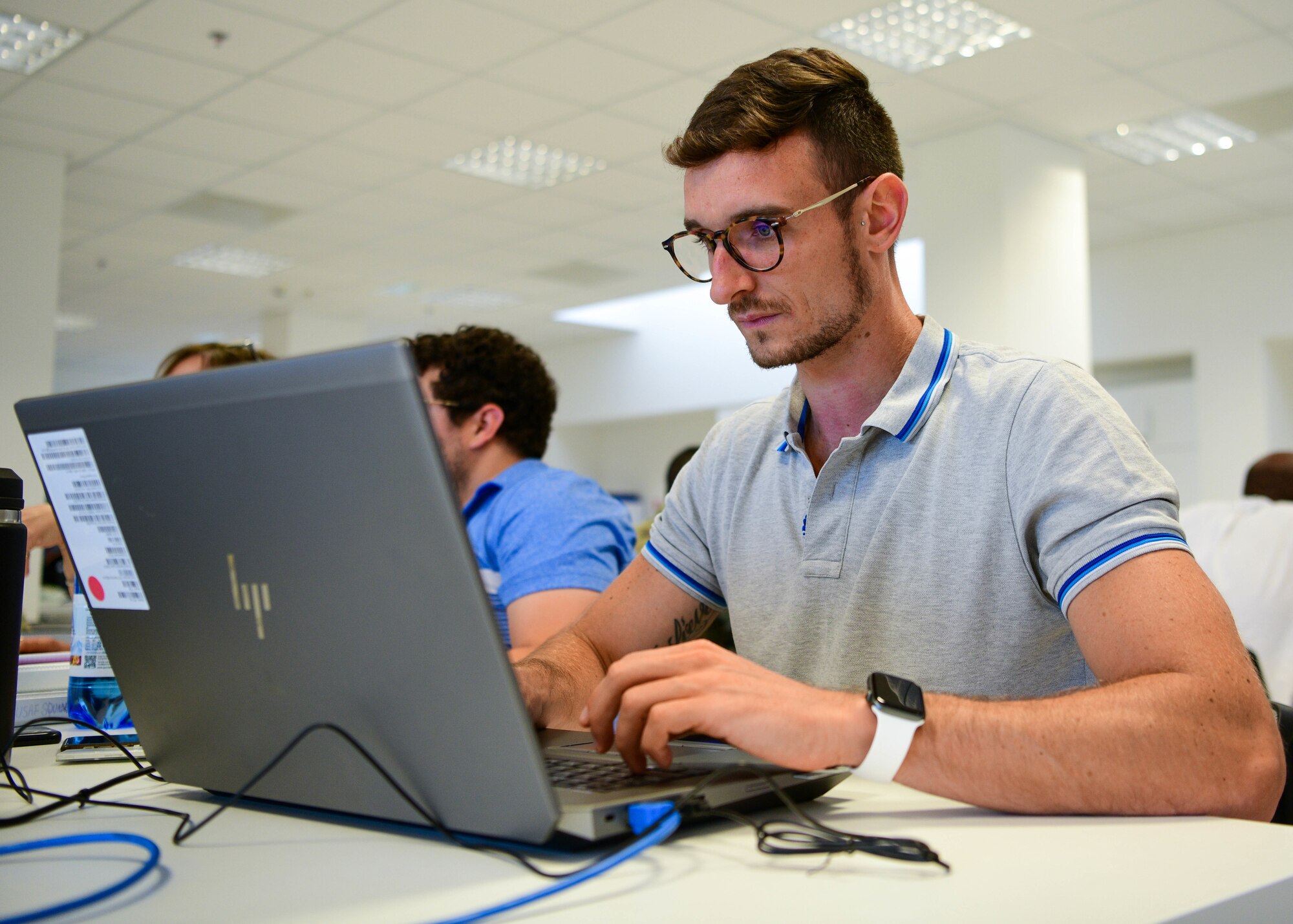 Nicholas Fregona, 31st Comptroller Squadron financial analyst, builds an automation script to improve a process in his workplace during a Robotics Process Automation (RPA) Roadshow Course at Aviano Air Base, Italy, Aug. 25, 2022. RPA is designed to do manual heavy repetitive tasks in a much more timely and efficient manner. (U.S. Air Force by Senior Airman Brooke Moeder)