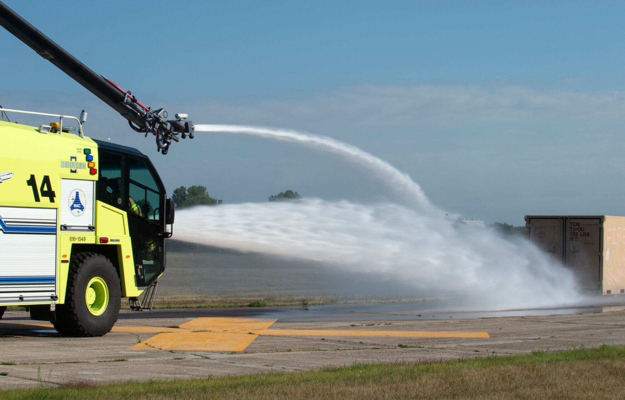 Firefighters from the Minneapolis-St. Paul Airport response to a simulated C-130 Hercules crash in St. Paul, Minn., Aug. 10, 2022.