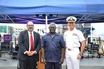 SOLOMON ISLANDS (Aug. 29, 2022) The Honorable Russ Comeau, U.S. Chargé D'Affaires for Solomon Islands, left; Manasseh Sogavare, Prime Minister of the Solomon Islands, center; and Capt. Kim, mission commander of Pacific Partnership 2022, right, pose for a photo during a public ceremony in Unity Square in the heart of Honiara. Now in its 17th year, Pacific Partnership is the largest annual multinational humanitarian assistance and disaster relief preparedness mission conducted in the Indo-Pacific. Pacific Partnership is a unifying mission that fosters enduring friendship and cooperation among many nations. This year’s mission in Solomon Islands will include participants from the United States, Japan and Australia. (Courtesy photo by Japan Maritime Self-Defense Force Sfc. Toshihiro Mizuochi)