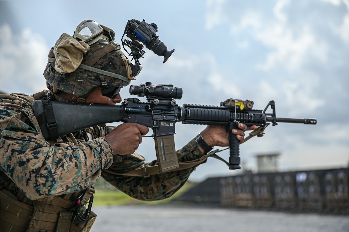 U.S. Marine Corps Lance Cpl. Jonathan Sutchen, a network administrator with Combat Logistics Battalion 4, Combat Logistics Regiment 3, 3rd Marine Logistics Group, fires his M16A4 service rifle during a table five and six range at Camp Hansen, Okinawa, Japan, Aug 28, 2022. Sutchen, a native of Brooklyn, New York, graduated from Williamsburg High School of Architecture and Design in 2020 and enlisted out of Recruiting Substation Brooklyn in 2020. The purpose of the training was to improve the Marines’ ability to operate their rifles at close quarters and in low-visibility environments more effectively. 3rd MLG, based out of Okinawa, Japan, is a forward-deployed combat unit that serves as III MEF’s comprehensive logistics and combat service support backbone for operations throughout the Indo-Pacific area of responsibility.