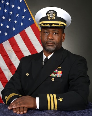 220901-N-SI161-0001 DAHLGREN, Va. (Mar. 09, 2020) Official portrait of Cmdr. Shaun E. Dennis. (U.S. Navy photo by Michael Bova)