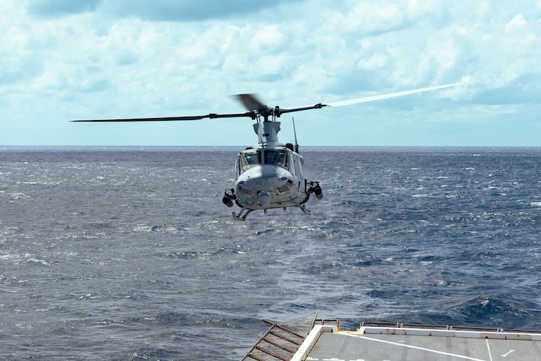 A U.S. Marine Corps UH-1Y Venom helicopter assigned to Light Attack Helicopter Squadron (HMLA) 773 prepares to land aboard the San Antonio class dock landing ship USS Mesa Verde (LPD 19) in the North Atlantic Ocean, Aug. 16, 2022. HMLA 773 launched three UH-1Y Venom and two AH-1Z Viper helicopters from McGuire Air Force Base and embarked them aboard the USS Mesa Verde for transit to Brazil in support of exercise UNITAS LXIII hosted by the Brazilian Navy and Marine Corps. UNITAS, which is Latin for “unity,” was conceived in 1959 and has taken place annually since first conducted in 1960. This year marks the 63rd iteration of the world’s longest-running annual multinational maritime exercise. Additionally, this year Brazil will celebrate its bicentennial, a historical milestone commemorating 200 years of the country’s independence. (U.S. Marine Corps photo by Cpl. Colton K. Garrett)