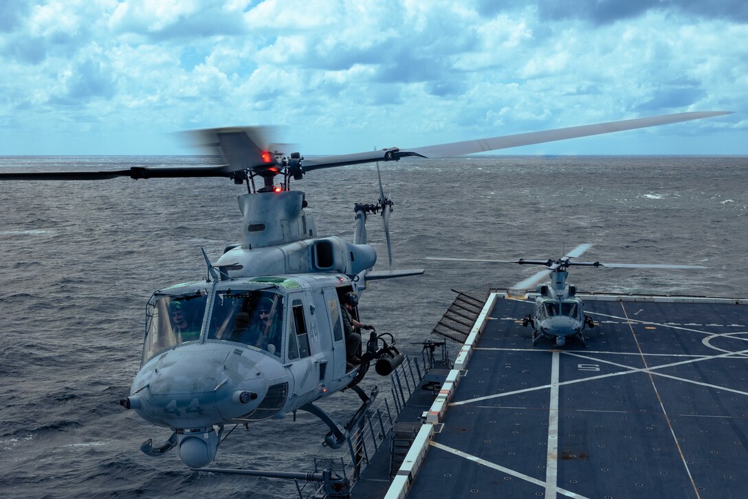 A U.S. Marine Corps UH-1Y Venom helicopter assigned to Light Attack Helicopter Squadron (HMLA) 773 hovers above the landing pad of the San Antonio class dock landing ship USS Mesa Verde (LPD 19) in the North Atlantic Ocean, Aug. 16, 2022. HMLA 773 launched three UH-1Y Venom and two AH-1Z Viper helicopters from McGuire Air Force Base and embarked them aboard the USS Mesa Verde for transit to Brazil in support of exercise UNITAS LXIII hosted by the Brazilian Navy and Marine Corps. UNITAS, which is Latin for “unity,” was conceived in 1959 and has taken place annually since first conducted in 1960. This year marks the 63rd iteration of the world’s longest-running annual multinational maritime exercise. Additionally, this year Brazil will celebrate its bicentennial, a historical milestone commemorating 200 years of the country’s independence.