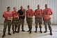 The medics from the 316th Medical Group, representing Air Force District of Washington, stand for a group photo after placing second overall in the 2022 Medic Rodeo at Cannon Air Force base, N.M., Aug. 18, 2022. From left to right, Staff Sgt. Jinnea Hebert, noncommissioned officer in charge of Medical Management; Staff Sgt. Kaylee Miller, 316th MDG tactical combat casulty care program manager; Senior Master Sgt. Eduardo Clemente, AFDW 4N Functional Manager; Staff Sgt. Ryon Boot-Dicks, medical technician, En-Route Patient Staging Facility; Capt. Matthew Patschull, group practice manager; and Master Sgt. Benjamin Bates, DiLorenzo Pentagon Health Clinic senior enlisted leader. The Medic Rodeo, hosted by the 27th Special Operations Wing, creates a ready medical force by testing the knowledge and skills of medics across the Air Force. (U.S. Air Force photo by 2nd Lt. Brandon DeBlanc)