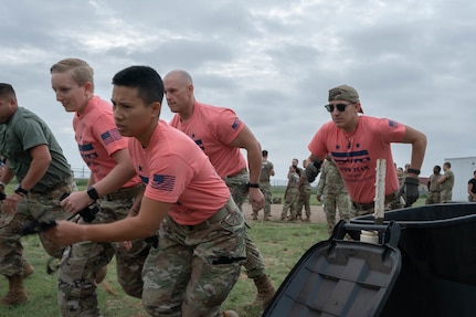 The Air Force District of Washington team races against the team from Hurlburt Field, Fla. during the Commando Challenge at Cannon Air Force Base, N.M., Aug. 18, 2022. The Medic Rodeo, hosted by the 27th Special Operations Wing, creates a ready medical force by testing the knowledge and skills of medics across the Air Force. (U.S. Air Force photo by 2nd Lt. Brandon DeBlanc)