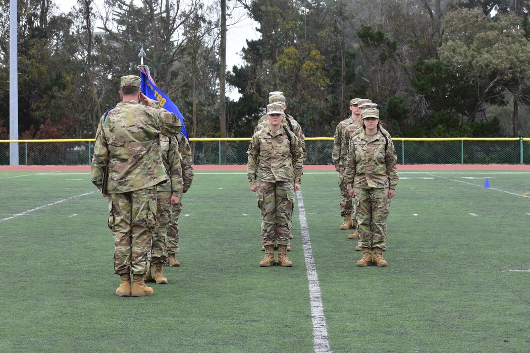 The 314th Training Squadron drill team waits at the position of attention to be inspected during the 2022 Drill Down competition at the Price Fitness Center, Presidio of Monterey, Calif., Aug. 19, 2022. Teams were evaluated on conducting an open ranks Inspection, standard flight formation marching, and then on exhibition drill performance. (Courtesy photo 517th TRG)