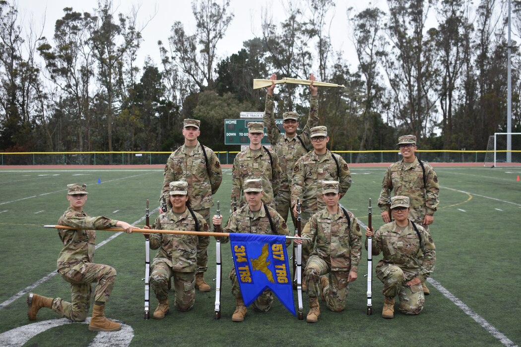The 314th Training Squadron drill team poses for a photo after winning the 2022 Drill Down competition at the Price Fitness Center, Presidio of Monterey, Calif., Aug. 19, 2022. The 314 TRS drill team won the competition by a .5-point difference. (Courtesy photo 517th TRG)