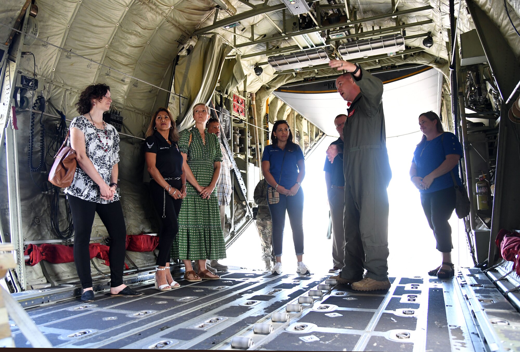 Keesler key spouses and spouses of base leadership tour the inside of a C-130J aircraft at Keesler Air Force Base, Mississippi, Aug. 31, 2022. The spouses also toured the Keesler Medical Center and the Fisher House and received a military working dog demonstration. (U.S. Air Force photo by Kemberly Groue)