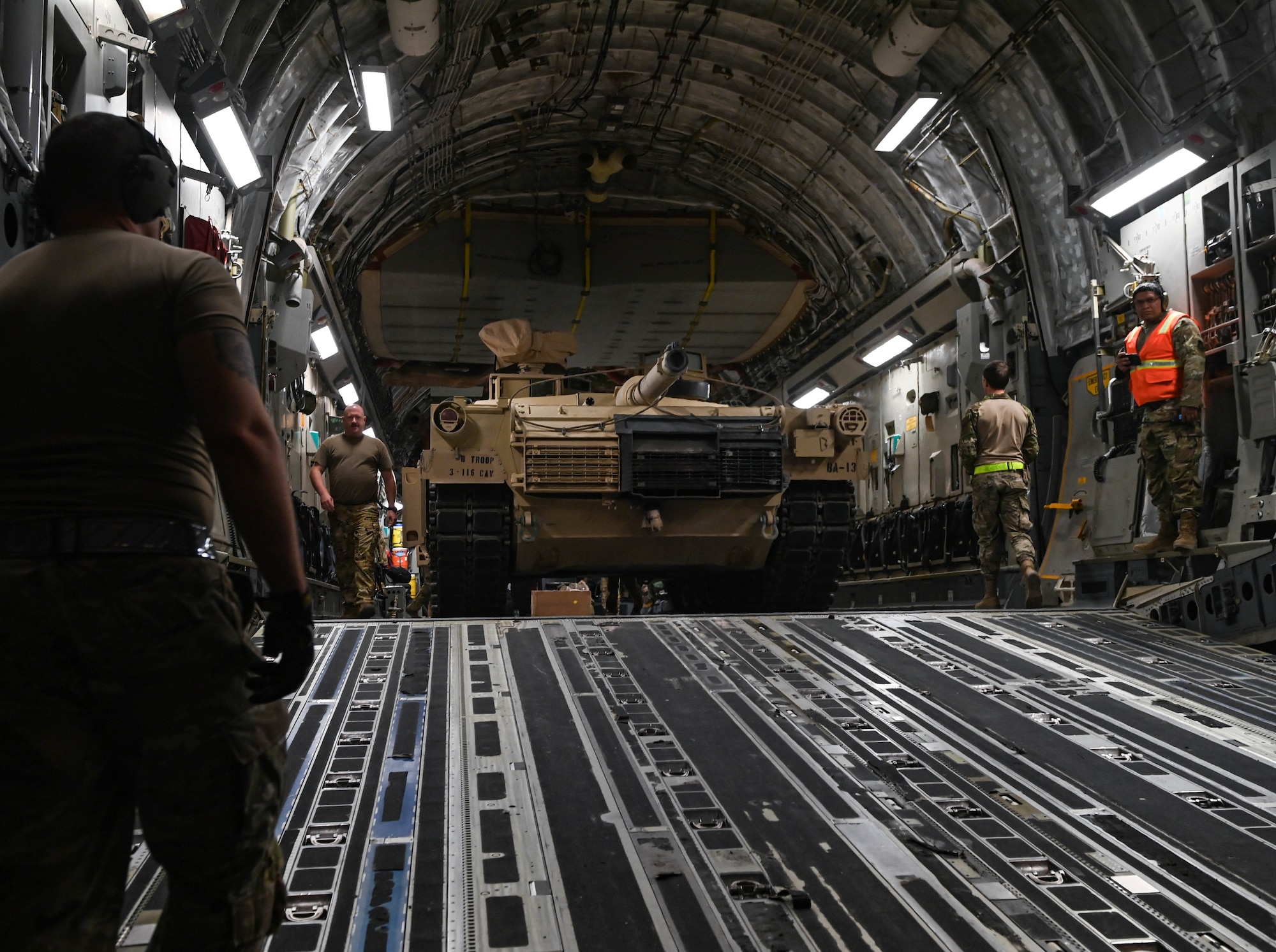 An M-1/A2 Abrams main battle tank is loaded onto an 816th Expeditionary Airlift Squadron C-17 Globemaster III aircraft Aug 27, 2022 at Ali Al Salem Air Base, Kuwait. The tank was transported to an undisclosed location. (U.S. Air National Guard photo by Master Sgt. Michael J. Kelly)