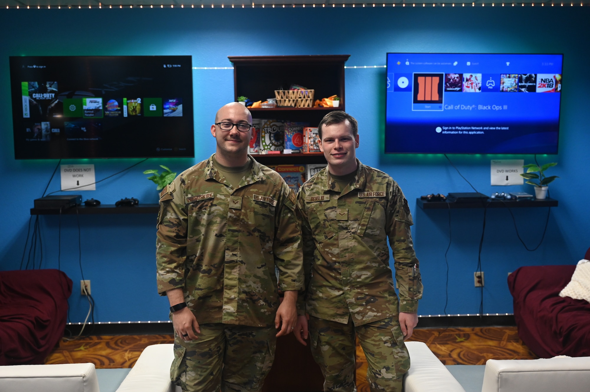U.S. Air Force Senior Airman Nathen Vanbuskirk, 607th Air Control Squadron weapons simulation technician, and Airman 1st Class Gabriel Benslay, 607th ACS weapons simulation technician, showcase the 607th ACS Viper Den, August 22, 2022 at Luke Air Force Base, Arizona. Vanbuskirk and Benslay assisted with the construction of the den, working off duty on the project to better support the total force. (U.S. Air Force photo by Airman 1st Class Jakob Hambright)