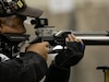 Retired U.S. Army Maj. William Hammac takes aim at his target during the 2022 Department of Defense Warrior Games at the Orange County Convention Center, in Orlando, Florida, Aug. 20, 2022. Hosted by the U.S. Army at the Walt Disney World Resort, this year’s Warrior Games sees service members and veterans from across the DoD competing in a variety of adaptive sports alongside armed forces athletes from Canada and Ukraine.