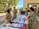 In the continuum of raising awareness of women in service and their corresponding contributions, Sailors at Navy Medicine Readiness and Training Command (NMRTC) San Diego observed Women’s Equality Day, Aug. 31. Capt. Kim Davis, (L), NMRTC commander, reviews information booths dedicated to highlighting the accomplishments of women in the military. NMRTC San Diego's mission is to prepare service members to deploy in support of operational forces, deliver high quality healthcare services and shape the future of military medicine through education, training and research. NMRTC employs more than 6,000 active duty military personnel, civilians and contractors in Southern California to provide patients with world-class care anytime, anywhere.