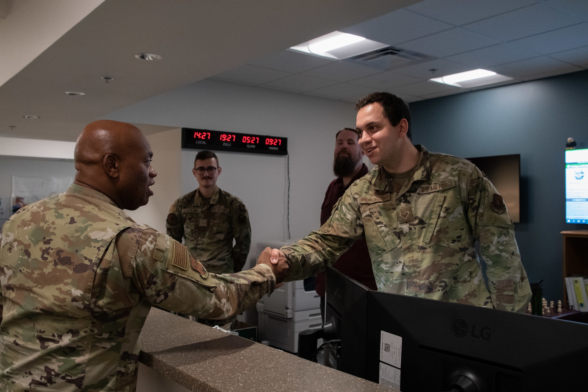 U.S. Air Force Senior Enlisted Advisor Tony L. Whitehead, the senior enlisted advisor to the chief of the National Guard Bureau, greets Senior Airman Francesco Piscani Daugherty, 509th Operational Support Squadron weather specialist at Whiteman Air Force Base, Missouri, Aug. 30, 2022. Whitehead visited the base to learn how National Guard Soldiers and Airmen contribute to state and national mission success. (U.S. Air National Guard photo by Airman 1st Class Phoenix Lietch)